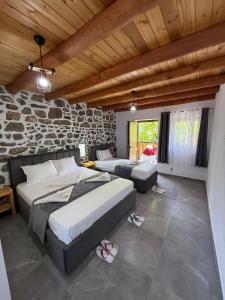 Postel nebo postele na pokoji v ubytování Guesthouse Te Tata