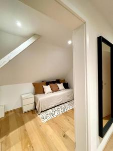 Postel nebo postele na pokoji v ubytování Ferienwohnung Im Städtle