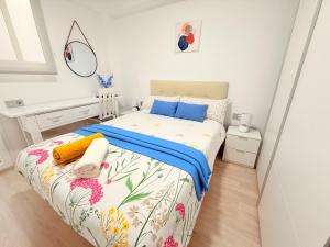 En eller flere senge i et værelse på Apartamento Luna