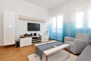 TV a/nebo společenská místnost v ubytování Siti Kvart, jednosoban stan