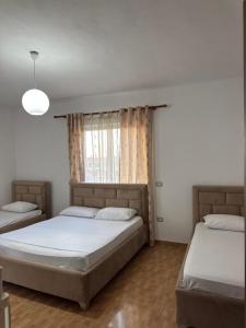 Voodi või voodid majutusasutuse GuestHouse Cami toas