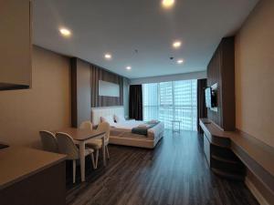 TV a/nebo společenská místnost v ubytování NOVA Seaside Living Apartments Batumi
