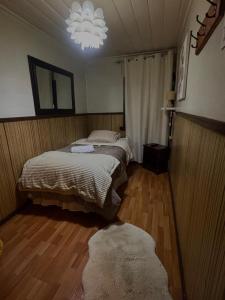 Postel nebo postele na pokoji v ubytování Hospedaje Colón