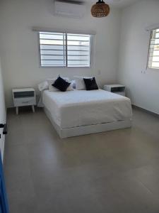 Postel nebo postele na pokoji v ubytování Villa Karol