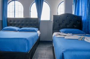 Postel nebo postele na pokoji v ubytování Airport Azul