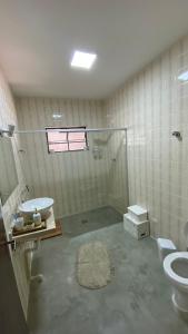 Et badeværelse på Fazenda Villino Pistilli + 32 billeder