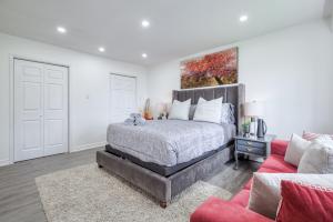 Postel nebo postele na pokoji v ubytování The Rosewood 5 Bedroom Specious Villa