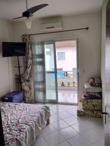 TV a/nebo společenská místnost v ubytování Ótima Casa em Muriqui