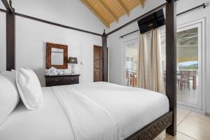 Postel nebo postele na pokoji v ubytování 5BR Villa Vista with Exclusive Pool by Bocobay + 45 fotografií