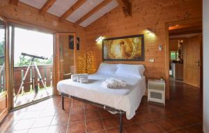 a bedroom with a bed with towels on it at Villa Al Tramonto in Lisciano Niccone +37 photos