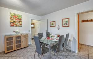 a dining room with a table and chairs at Ferienwohnung Mirow in Mirow
