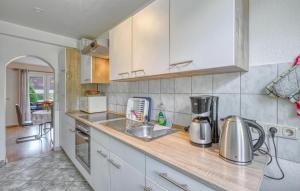 Kuchyň nebo kuchyňský kout v ubytování Ferienwohnung Blankensee