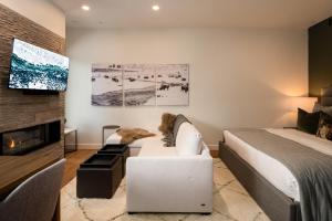 En eller flere senge i et værelse på 230 LakeLodge condo