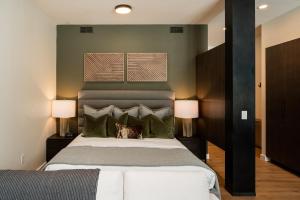 En eller flere senge i et værelse på 230 LakeLodge condo