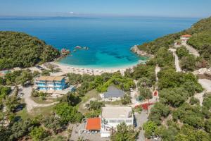 an aerial view of a beach with a resort at Theros Blu in Sarakiniko +37 photos