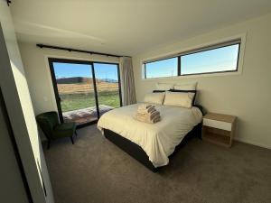 Ένα ή περισσότερα κρεβάτια σε δωμάτιο στο The Pyramid - Mauri Tau