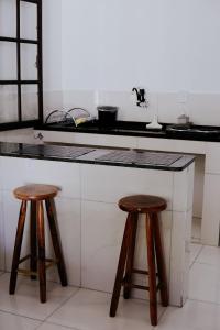 Η κουζίνα ή μικρή κουζίνα στο Relaxe no frescor de Niterói