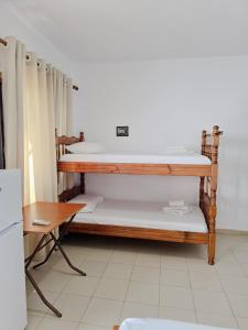 Voodi või voodid majutusasutuse Azure Hotel Dhermi toas