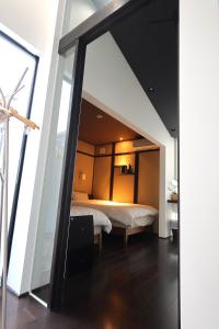 Letto o letti in una camera di Uji-Ichibanyado-Nigauri