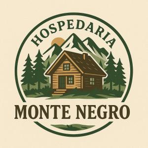 a log cabin in front of a mountain at Hospedaria MonteNegro in Campos do Jordão