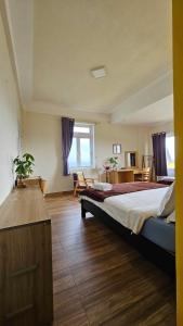 Postel nebo postele na pokoji v ubytování Century House