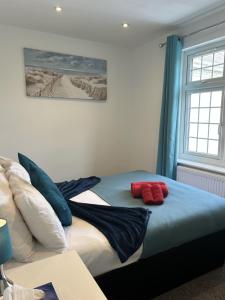 Voodi või voodid majutusasutuse Boardlands House 3 Bed home toas