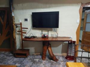 Μια τηλεόραση ή/και κέντρο ψυχαγωγίας στο Casita del Puente Curarrehue