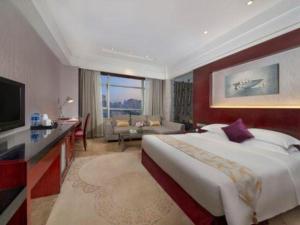 TV a/nebo společenská místnost v ubytování Fuzhou Xin Zi Yang Hotel