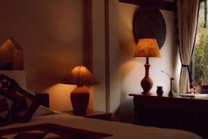 Letto o letti in una camera di The Dwarika's Hotel