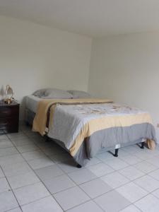 Postel nebo postele na pokoji v ubytování Cobán room