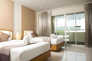 Fotografie z fotogalerie ubytování TK Mansion v destinaci Ban Kohong + 34 fotografií