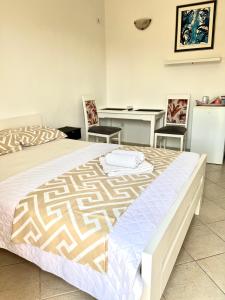 Postel nebo postele na pokoji v ubytování Apartmani Bekonja