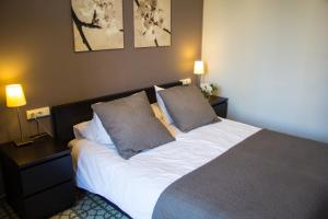 Cama o camas de una habitación en Barcelonaguest