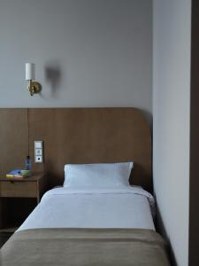 Primavera Hotel客房内的一张或多张床位