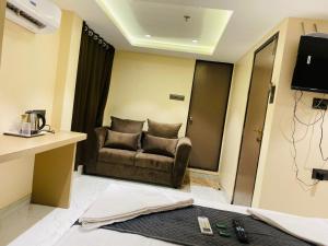 TV a/nebo společenská místnost v ubytování Hotel Dolphin Residency
