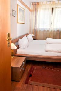 Postel nebo postele na pokoji v ubytování Hotel Kugel