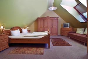 Postel nebo postele na pokoji v ubytování Hotel Kugel