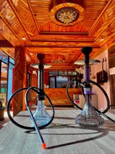 a couple of microphones sitting on top of a table at Hotel Bollywood in Kasol