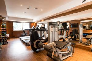 a gym with treadmills and elliptical machines at Windsor Leme Hotel in Rio de Janeiro