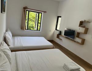 Letto o letti in una camera di Chàm’s Corner Lookout Homestay & Restaurant