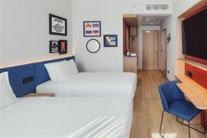 Postel nebo postele na pokoji v ubytování Hampton By Hilton Venice Isola Nuova