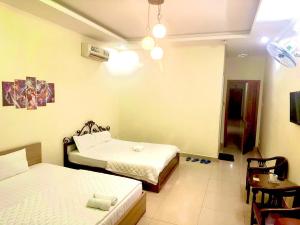 Postel nebo postele na pokoji v ubytování 158A Hotel