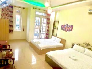 Postel nebo postele na pokoji v ubytování 158A Hotel
