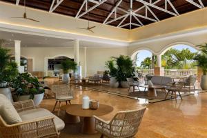 Posezení v ubytování Wyndham Alltra Punta Cana All Inclusive Resort