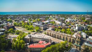 an aerial view of a city with buildings and the ocean at Liva Hotel in Liepāja