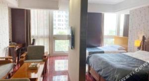 Chonpines Hotel Beijing Daxing Airport Caoqiao Metro Station客房内的一张或多张床位