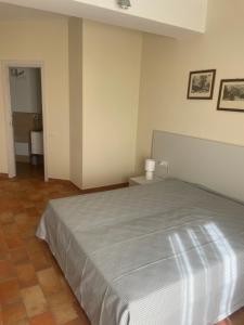 Postel nebo postele na pokoji v ubytování Bellavista Rooms
