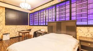 Postel nebo postele na pokoji v ubytování Tabist Hotel Please Kobe