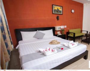 Postel nebo postele na pokoji v ubytování Twilight Inn