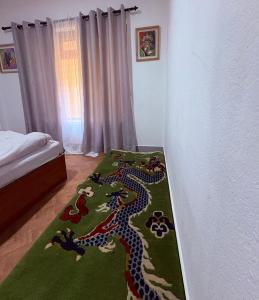 Letto o letti in una camera di DRAKON NEST HOMESTAY